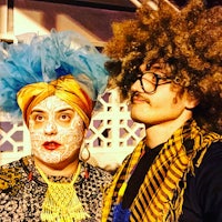 a man and a woman with afro hair